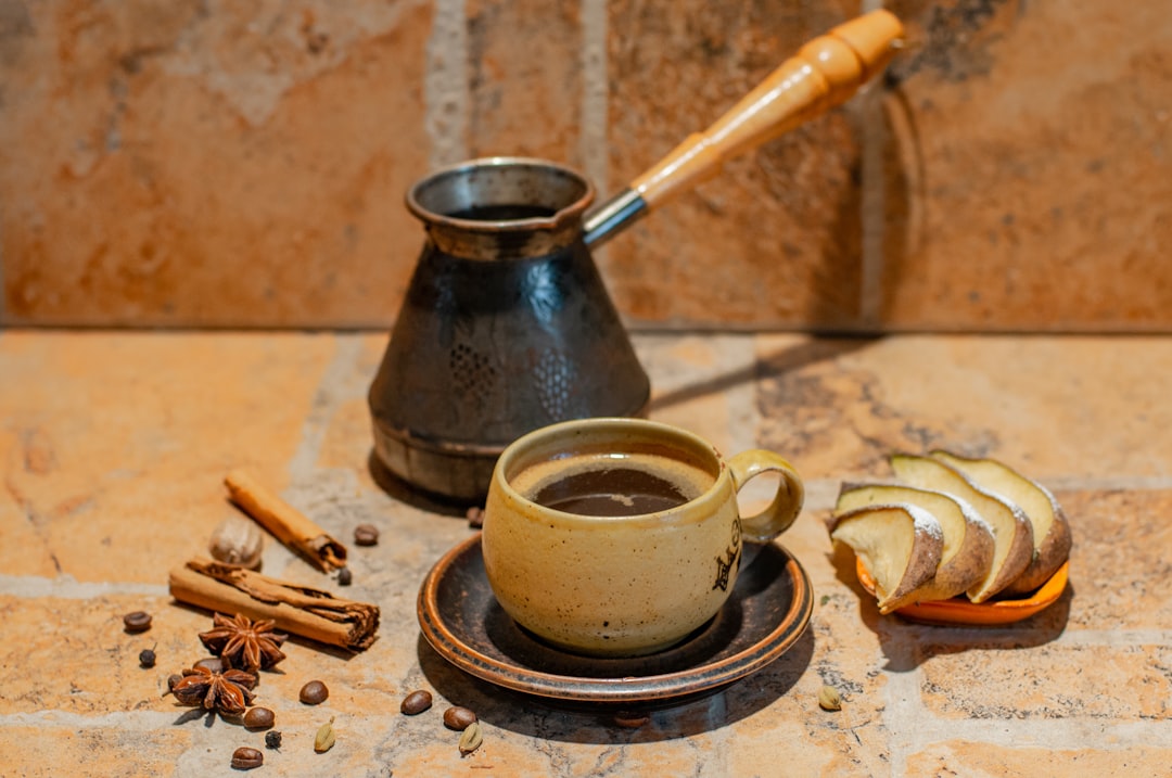 home-services-004 a-cup-of-coffee-and-a-spoon-isjsr5xb3pa